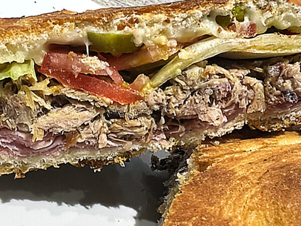 Cuban Sandwich. Focaccia bread with Parmacotto, roasted pork, swiss, pickles, lettuce, tomato, mustard - Image 3